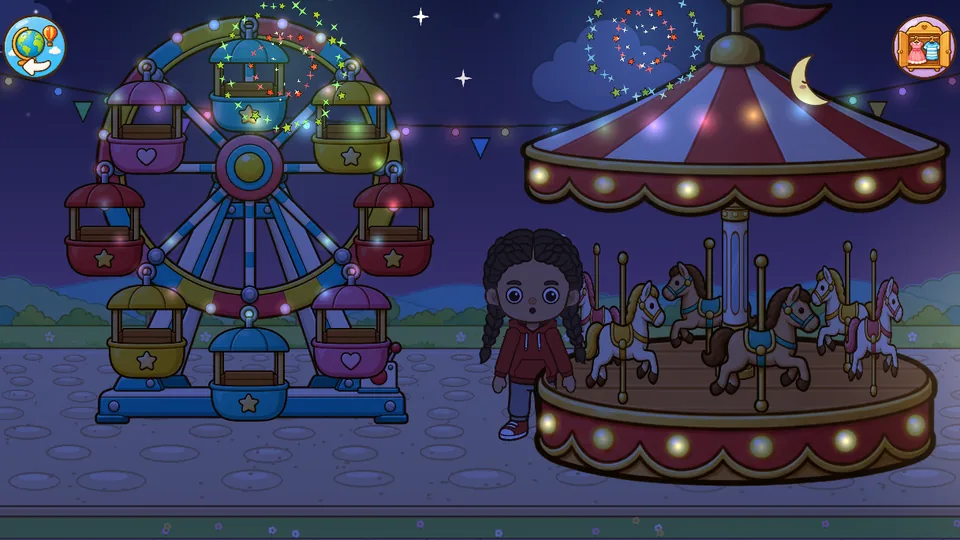Night at the funfair: the lights come on